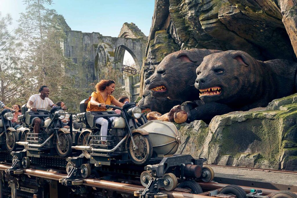 Family riding on Hagrid's Motorbike Adventure roller coaster at Universal Orlando