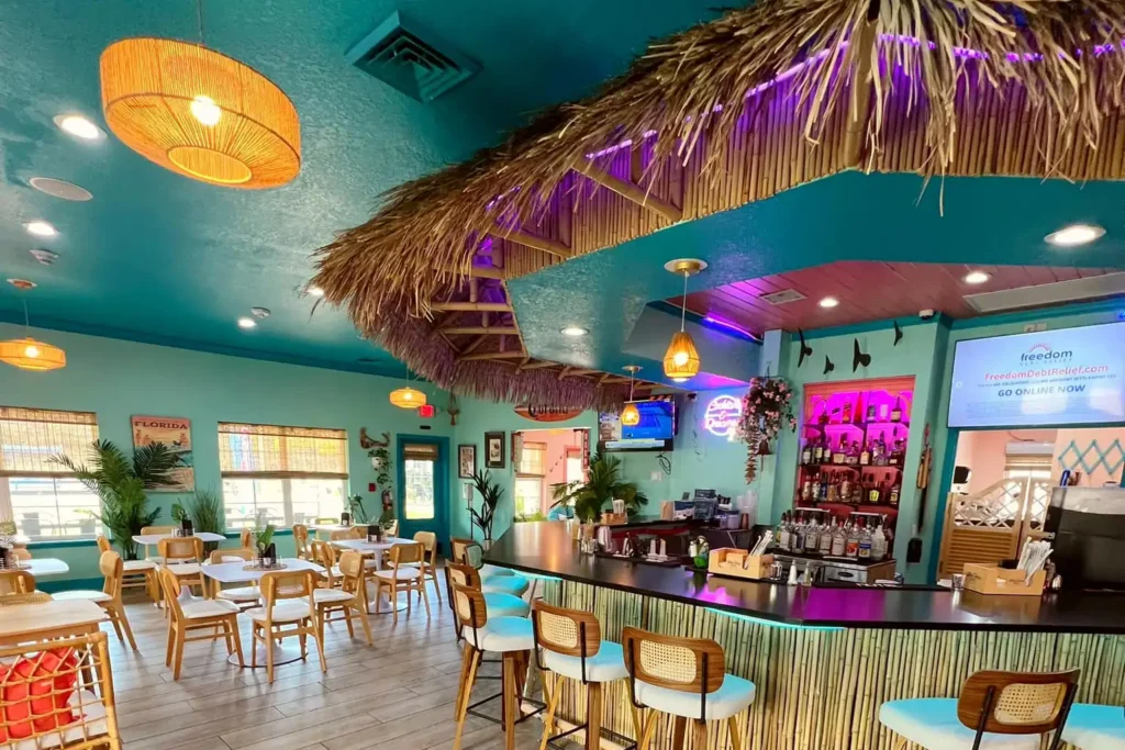 Tiki bar inside The Palms Barcade and Lounge at Island Oaks